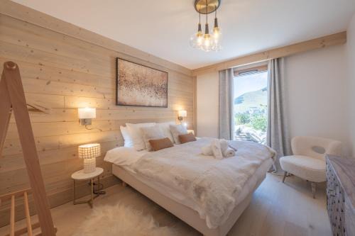 Bergers Apartment | Alpe d'Huez Houses - Chez Côme, Nid douillet dans résidence Spa 5 étoiles, skis au pied, avec vue et jardin
