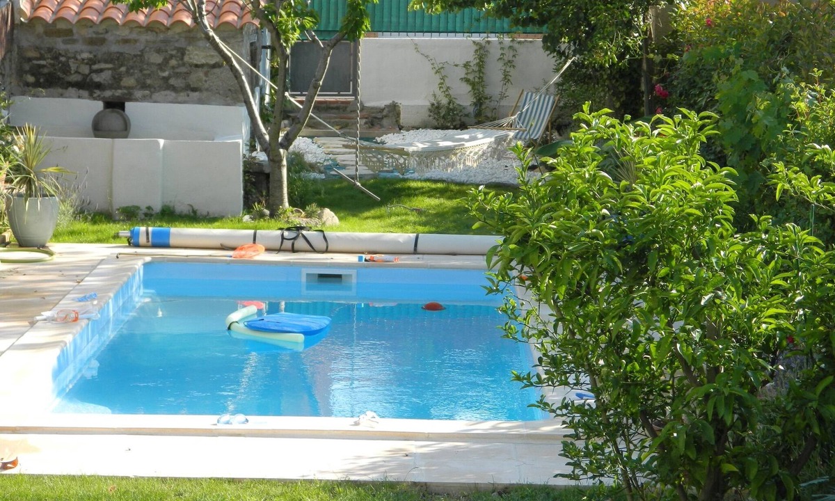 Saint-Genis House | Pretty village house with private heated pool and a/c. Opposite historic church.