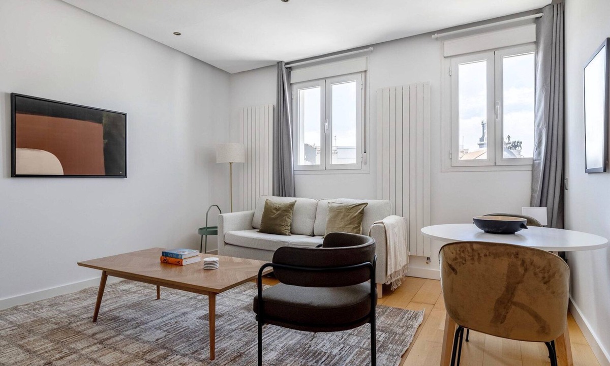 Cortes Apartment | Upscale Sol 1BR w/Doorman, nr Plaza España, by Blueground