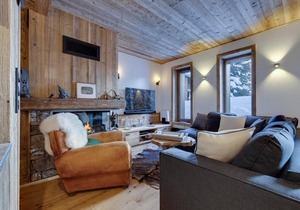 Superbe duplex 68m² avec cheminée, 2 chambres, parking intérieur, et services inclus à Val d'Isère - FR-1-567-46