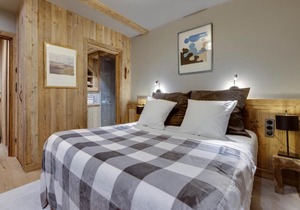 Superbe duplex 68m² avec cheminée, 2 chambres, parking intérieur, et services inclus à Val d'Isère - FR-1-567-46