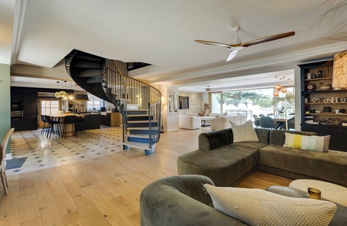 Montelier House | A magnificent stone mansion with a large swimming pool and a hot tub.
