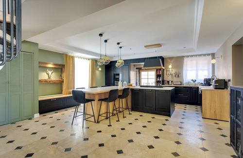Montelier House | A magnificent stone mansion with a large swimming pool and a hot tub.