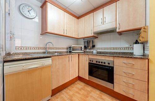 Sant Carles de la Rapita Apartment | Apartment 'Edificio Simancas' Balcony and Air Conditioning
