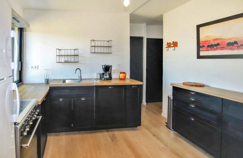 Reauville Apartment | Beautiful modern apartment with simple interior and neat decoration.