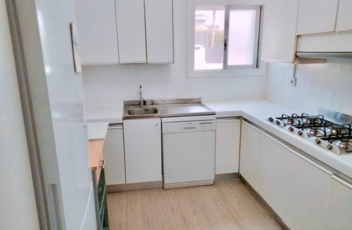 Canet de Mar Apartment | Bright 'Bruc Beach' Apartment with Private Pool, Wi-Fi & Air Conditioning