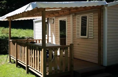 Oust House | COUFLENS MOBILE HOME with covered patio, sleeps 6