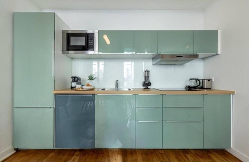 L'Europe Apartment | Elegant Parisian Retreat: Spacious Four-Bedroom Apartment Near Opera Garnier