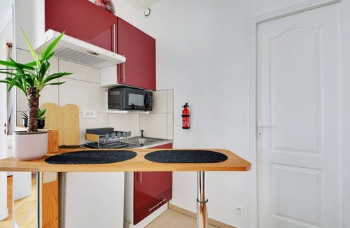 Quartier de Rochechouart Apartment | GuestReady - Neat stay near the wall of Love