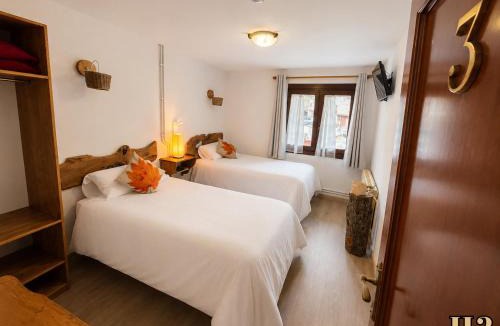 Taull House | Hostal Rural Sant Climent - Habitacions i Apartaments