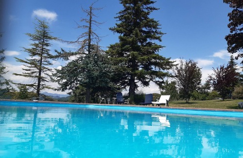 Santa Eulalia de Puigoriol House | House with pool and garden, ideal for families. Minimum 6 guests.