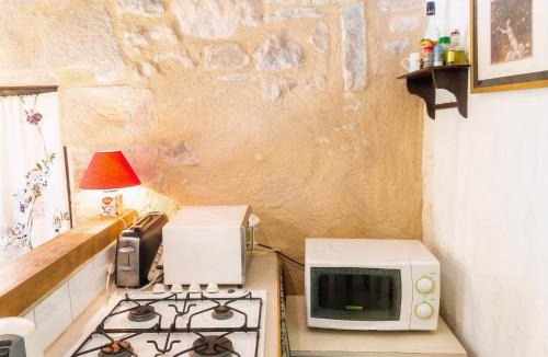 Autoire House | La Couple, Séjour à deux au Château d'Autoire, studio de charme, tonnelle, vue vallée et village