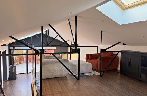 Downtown Villa | Magnifique loft industriel-chic avec patio