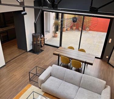 Downtown Villa | Magnifique loft industriel-chic avec patio