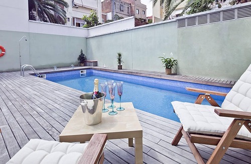 la Vila de Gracia Apartment | My Space Barcelona Apart. in a building with a shared swimming pool in Gracia