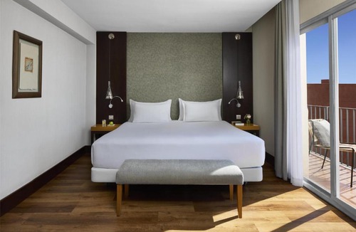 La Maternitat i Sant Ramon Hotel | NH Barcelona Stadium