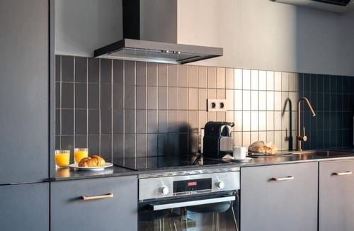 La Nova Esquerra de l'Eixample Apartment | One Building. Many Ways to Live!