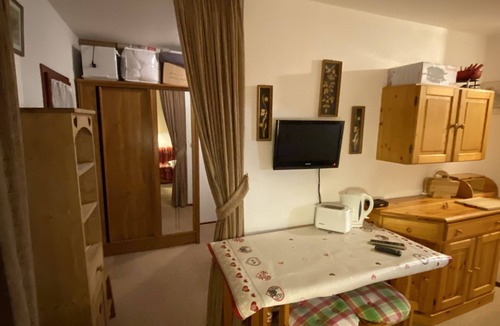 Manigod Apartment | South-facing mountain-view apartment with ski-in, ski-out convenience