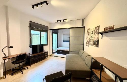 Vic - Remei Apartment | Urban Manesa city center apartment with private patio