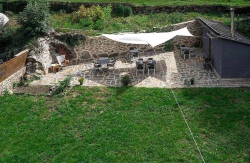 Les Apartment | Val Aran: apartamento con chimenea,jardín y vistas