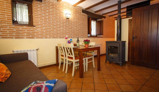 Comfortable bedroom apartment and sofa bed on the ground floor with fireplace