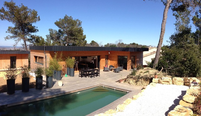 Contemporary wooden house with swimming pool on large quiet plot.