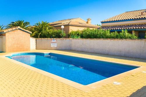 Maison dans résidence avec piscine