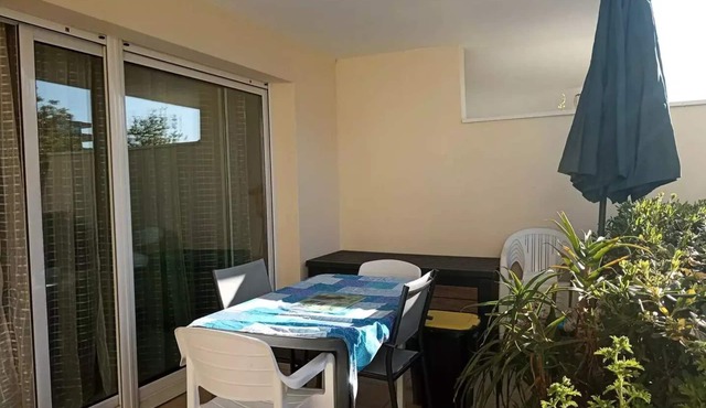 One-bedroom apartment on the ground floor with a large terrace and small garden overlooking the marina 4MPORTS23