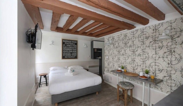 Studio parisien 20m2 en face du musee Grevin - 2P