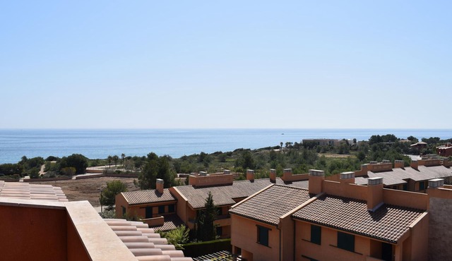 Stunning Duplex with Pool, Solarium, and Parking Near Beautiful Coves