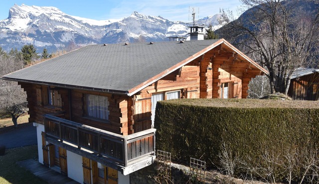 Typical Savoyard wooden chalet facing Mont Blanc