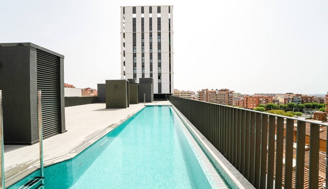 Vacation Apartment "Sunsets & Pool in Barcelona" with Balcony, Shared Pool & Wi-Fi
