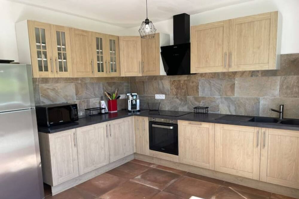 Photo of Kitchen in Saint-Julien-les-Rosiers