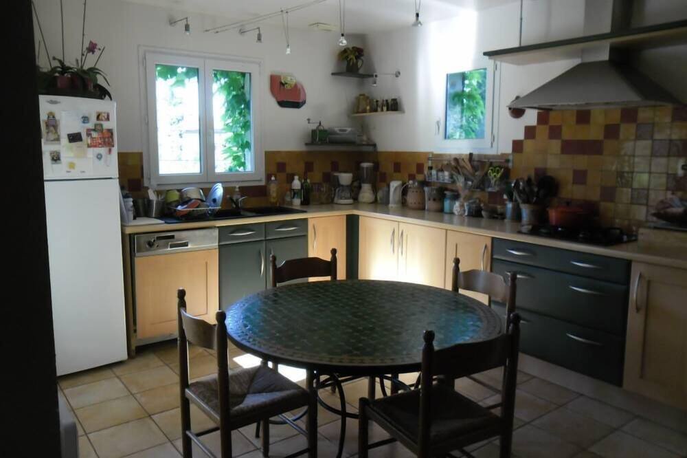Photo of Kitchen in Saint-Julien-les-Rosiers