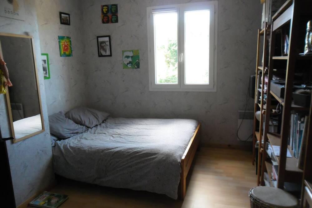 Photo of Bedroom in Saint-Julien-les-Rosiers