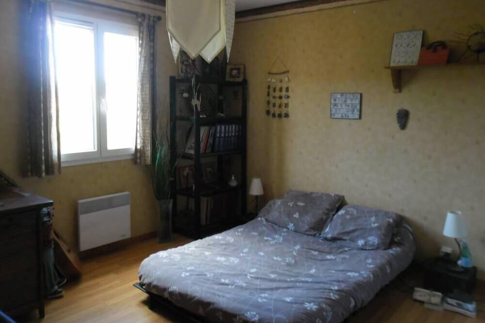 Photo of Bedroom in Saint-Julien-les-Rosiers