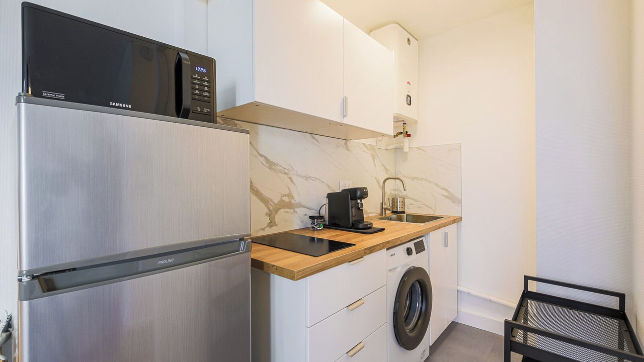 Photo of Kitchen in Quartier Exposition-Bajatiere