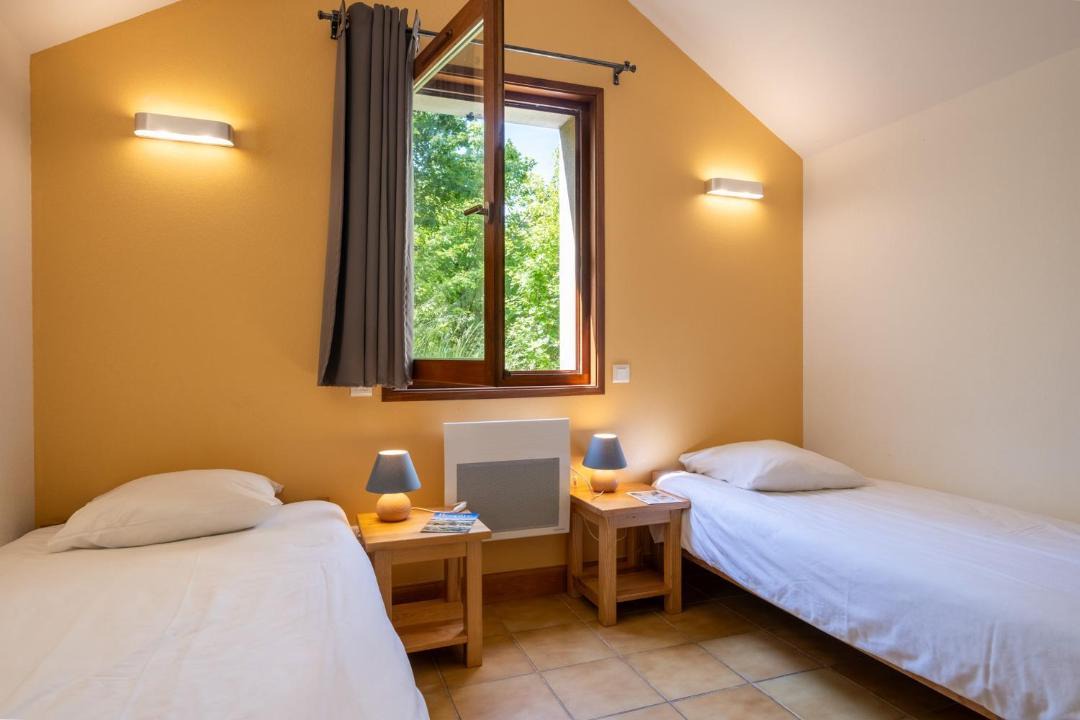 Photo of Bedroom in Saint-Rome-de-Dolan